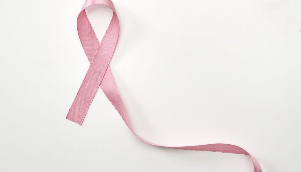 Pink ribbon symbol Breast Cancer Awareness on white background Pink ribbon symbol Breast Cancer Awareness on white background
